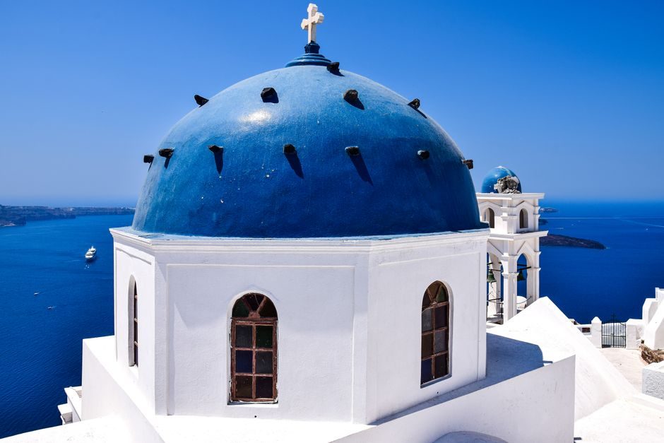 Whitewashed houses and blue domes in Santorini, Greece